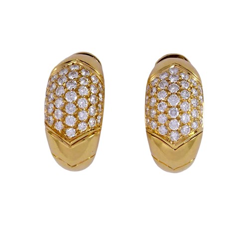 Pair of diamond set bombe hoop style earrings by Bulgari, Italy, testing as 18ct gold,